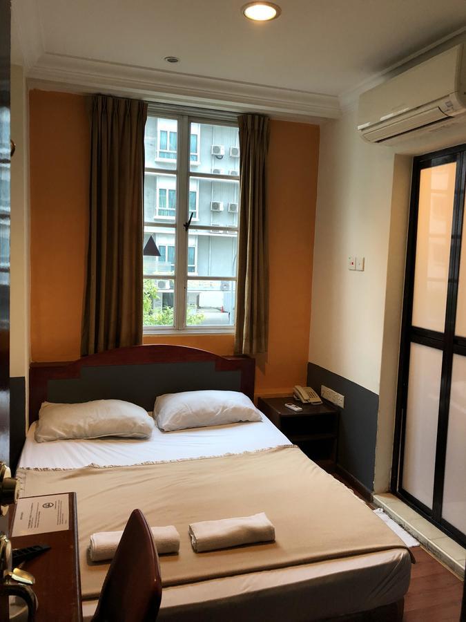 Happy Hotel Singapore Værelse billede