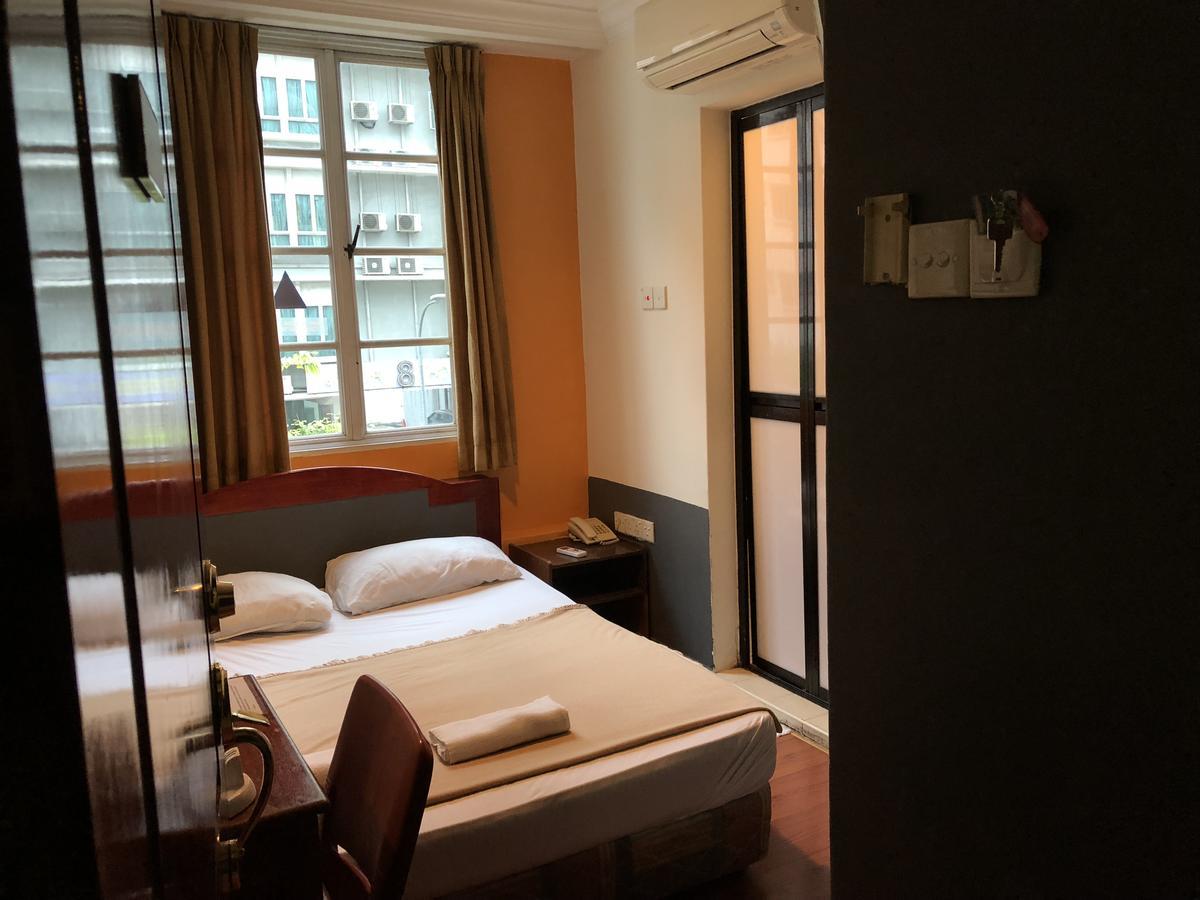 Happy Hotel Singapore Værelse billede